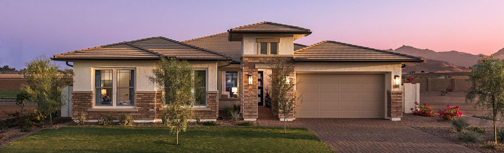 Azalea front exterior model home within the Alamar community in Avondale, AZ